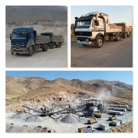 Stone crushing plant at a quarry with gravel and aggregate stockpiles, and trucks and tippers hauling construction materials